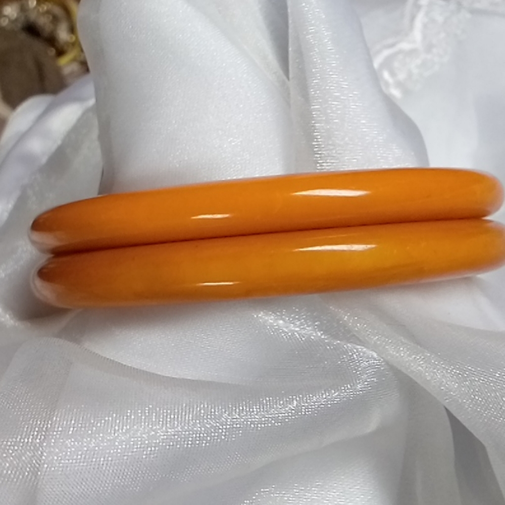 Two vintage carved Bakelite bracelets